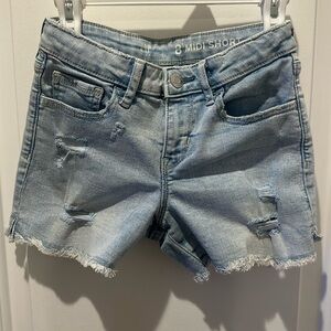 Here we have some light blue denim shorts. Size 8 girls with adjustable waist